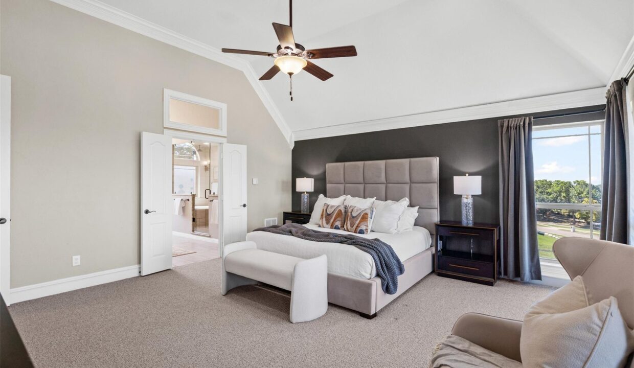 2413 Versailles Drive Heath, TX bedroom with accent wall