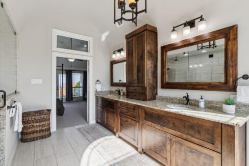 2413 Versailles Drive Heath, TX bathroom with dark wood