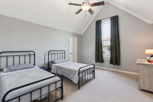 2413 Versailles Drive Heath, TX bedroom with two twin beds