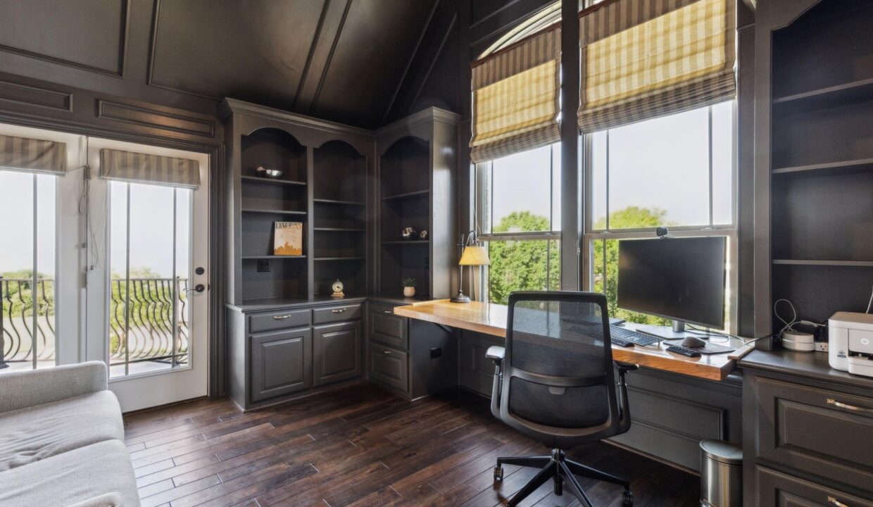 2413 Versailles Drive Heath, TX office with dark cabinetry