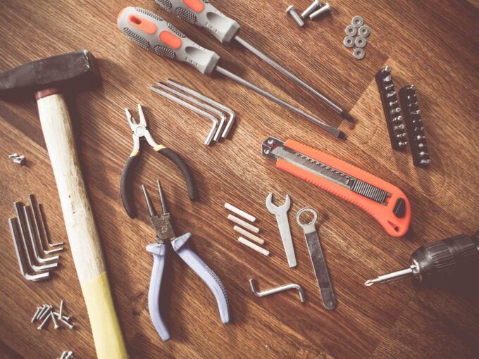 How to Handle Repairs and Maintenance Issues When Buying a Home hammer and tools