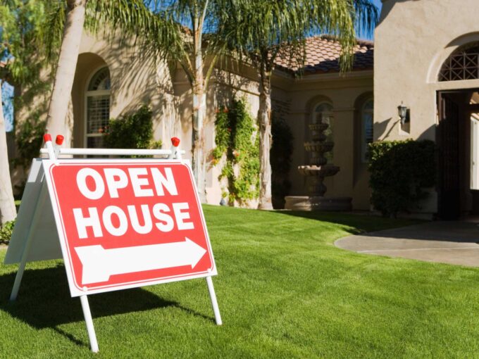 open house sign in from of home for sale